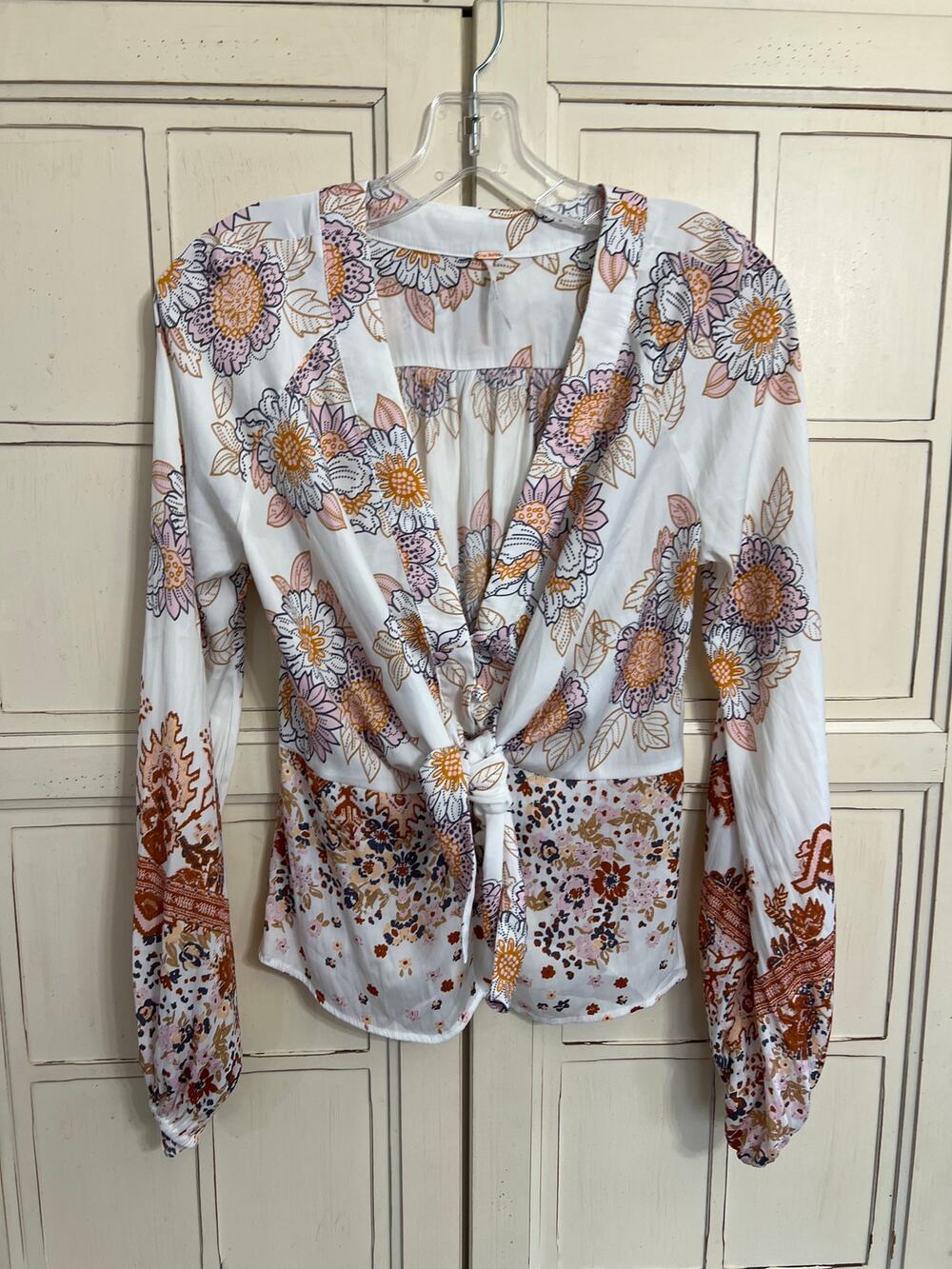 Free People size XS Run Free top blouse shirt ties in front of